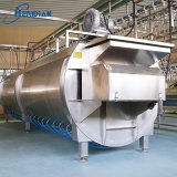 Poultry carcasses immersed in spiral chilling tank with even temperature control